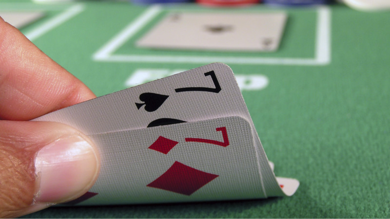 Two sevens as a starting hand in a game of texas hold em.